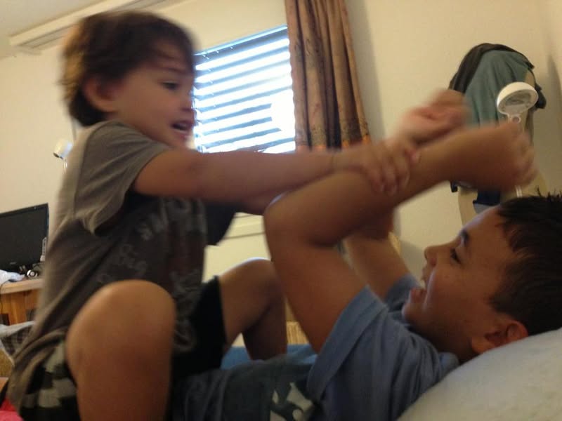 Sibling Showdown: A Bedtime Battle of Giggles