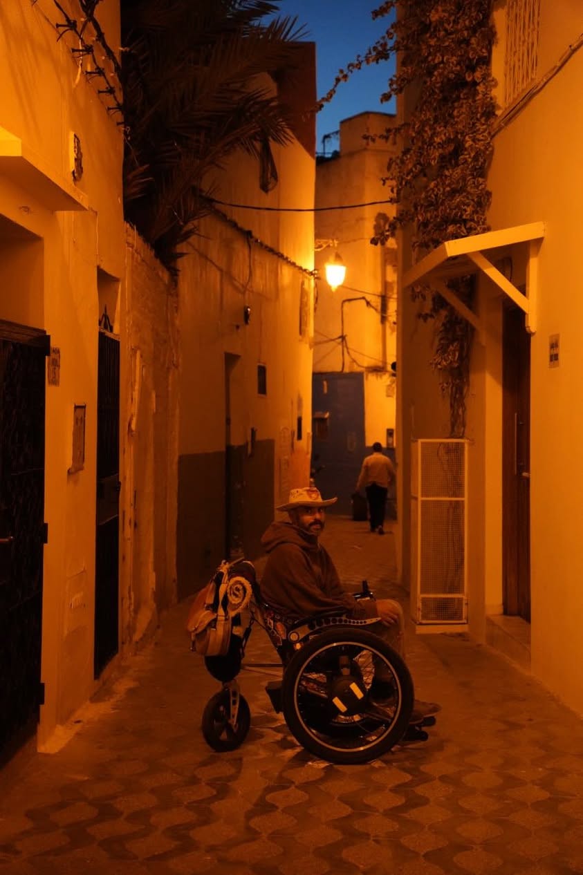 Friday evening in Asilah. A soft breeze drifts through the…