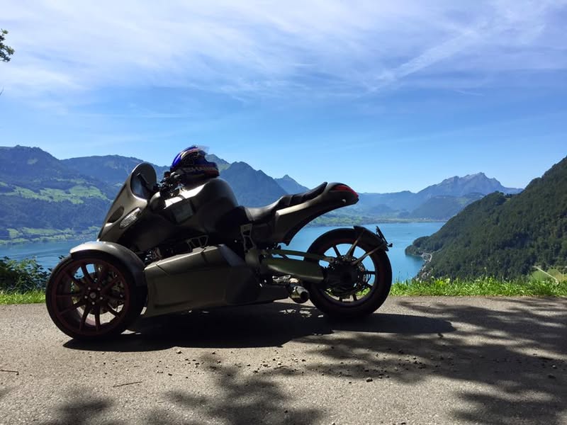 Open Road, Open Skies: A Rider’s Serene Stop Amidst Alpine Majesty